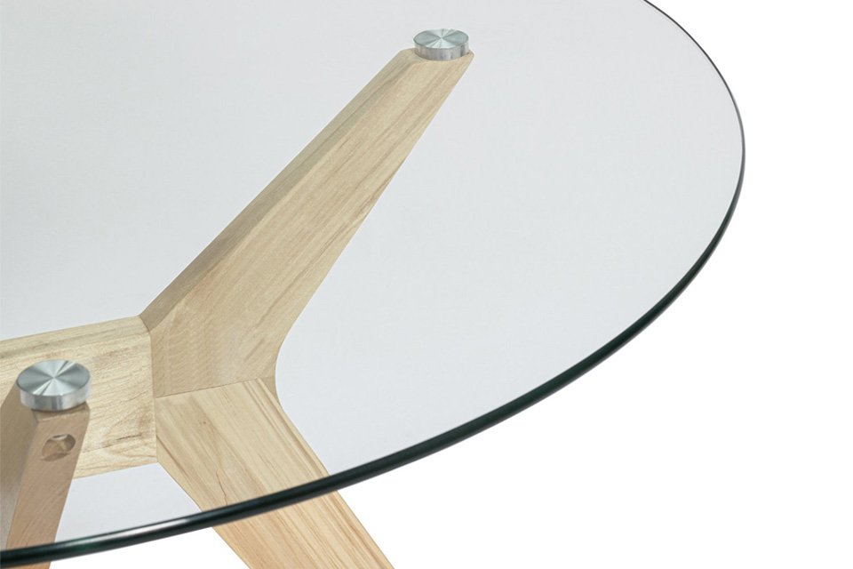 A Habitat Zela glass 4 seater dining table.